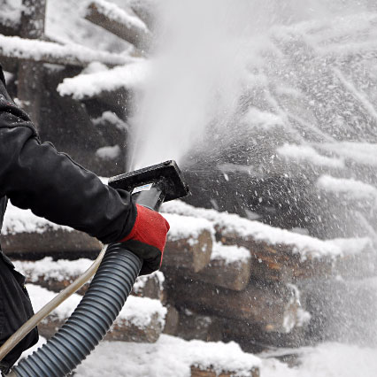 Spraying artificial snow effects